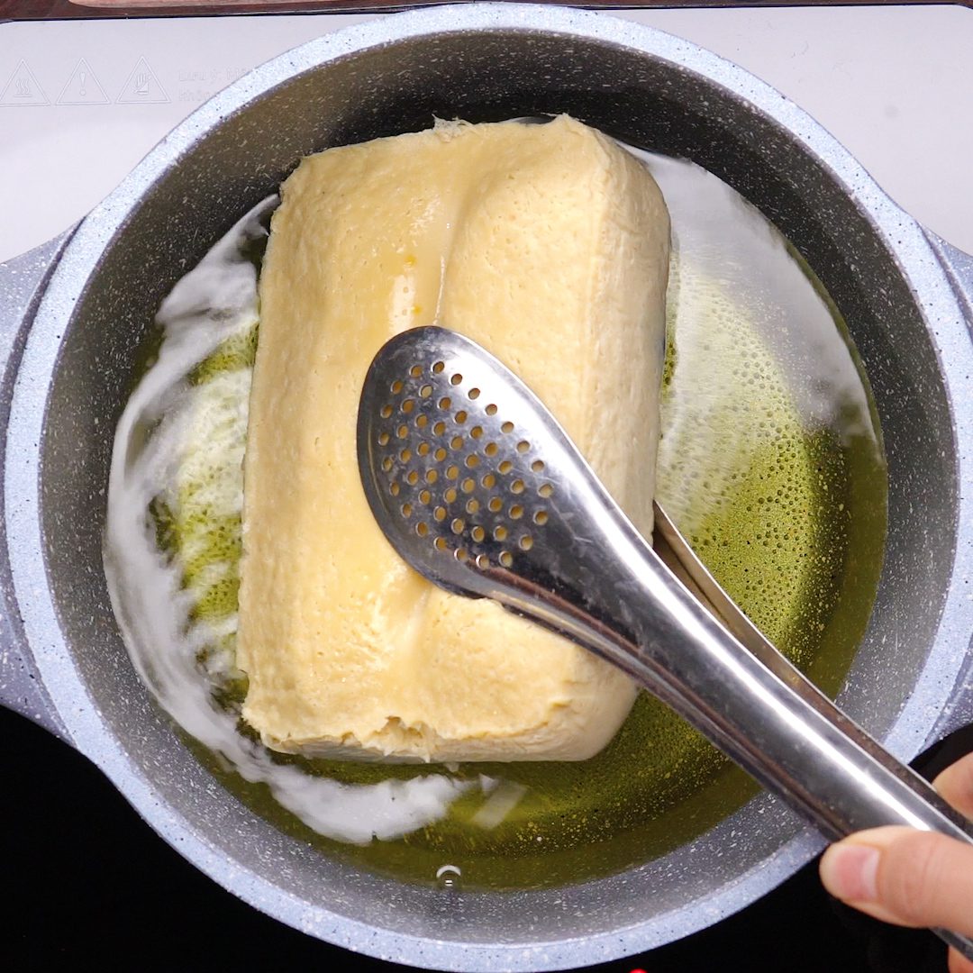 Step 3 Frying soft tofu with century egg Century egg tofu