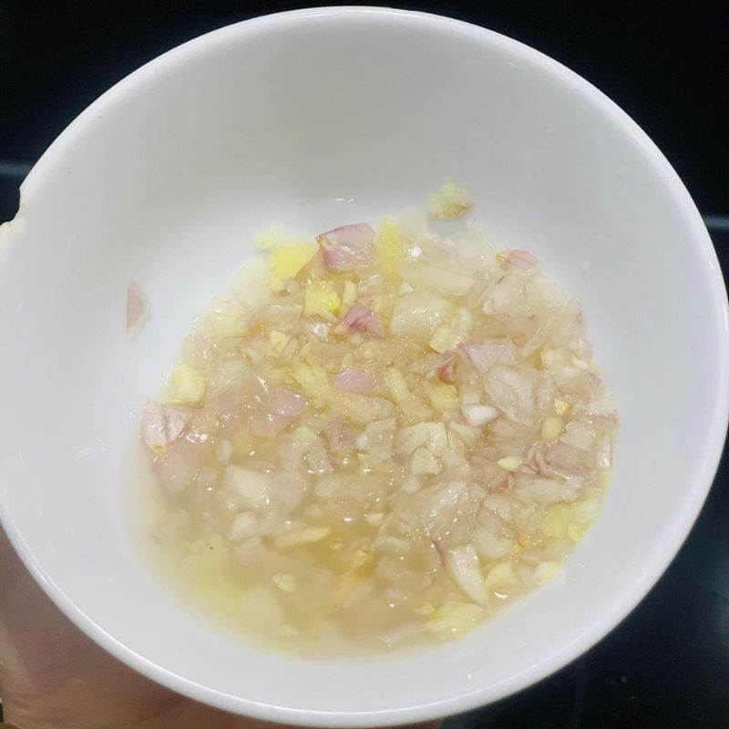 Step 3 Marinate the meat Pork belly with quail eggs in coconut water