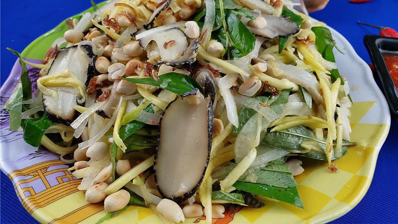 Mango salad with sea snails