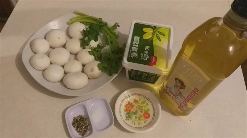 Ingredients for sautéed mushroom dish with salt and pepper and lemon butter sautéed