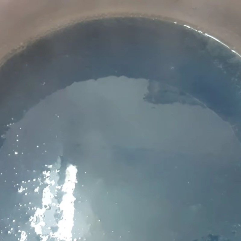 Step 3 Cooking the jelly mixture with butterfly pea flower jelly powder