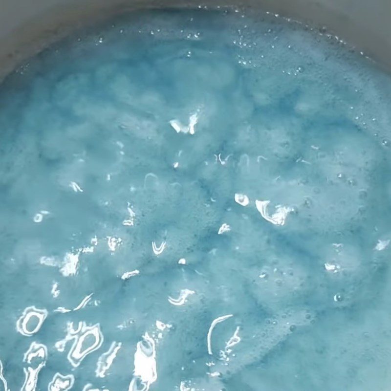 Step 3 Cooking the jelly mixture with butterfly pea flower jelly powder