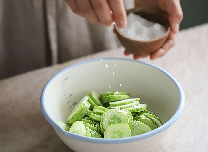 Step 2 Marinate cucumbers with seasoning powder for Quick Pickled Cucumbers