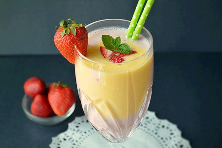 Milk smoothie combined with banana, apple, strawberry, and mango