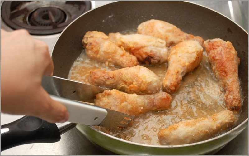 Stir the chicken evenly while frying