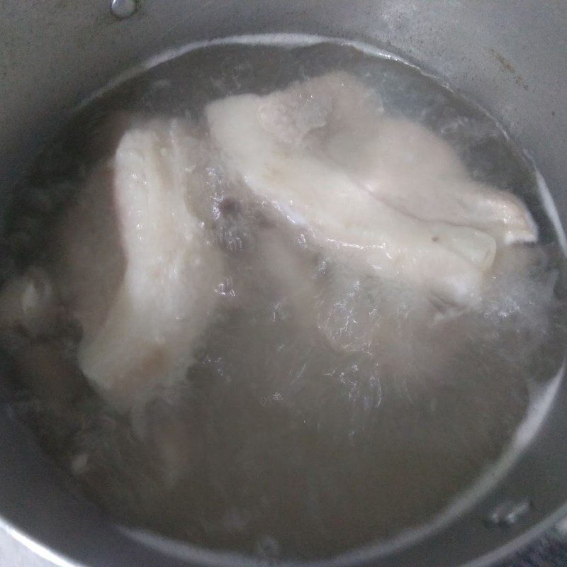 Step 2 Boil and slice the meat Boiled meat wrapped in rice paper