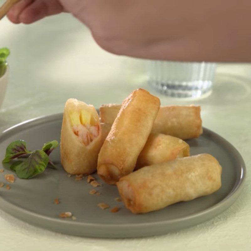 Step 6 Final product Seafood spring rolls with mayonnaise sauce in a non-stick pan