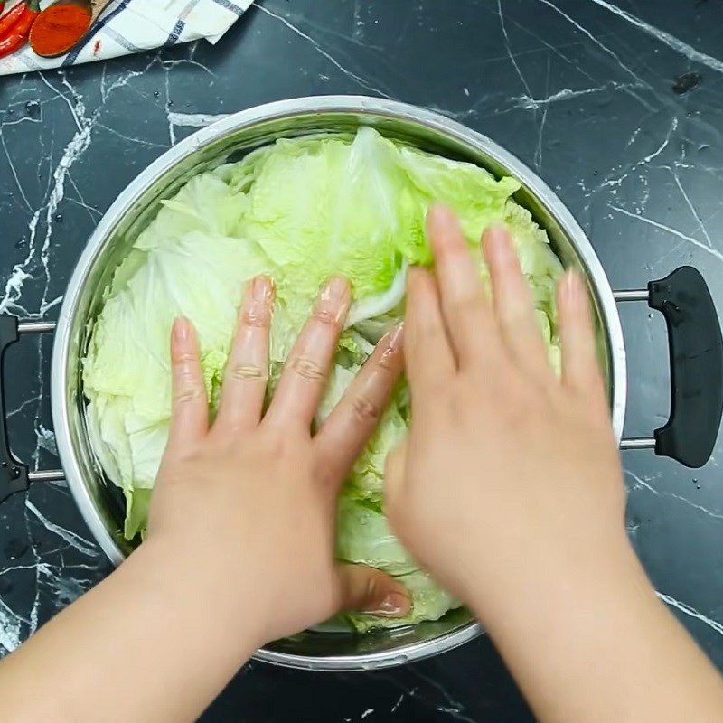 Step 2 Soak the cabbage in saltwater for Sweet and Sour Pickled Cabbage