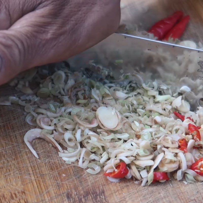 Step 2 Chop the spices finely Dried snakehead fish fried with lemongrass and chili