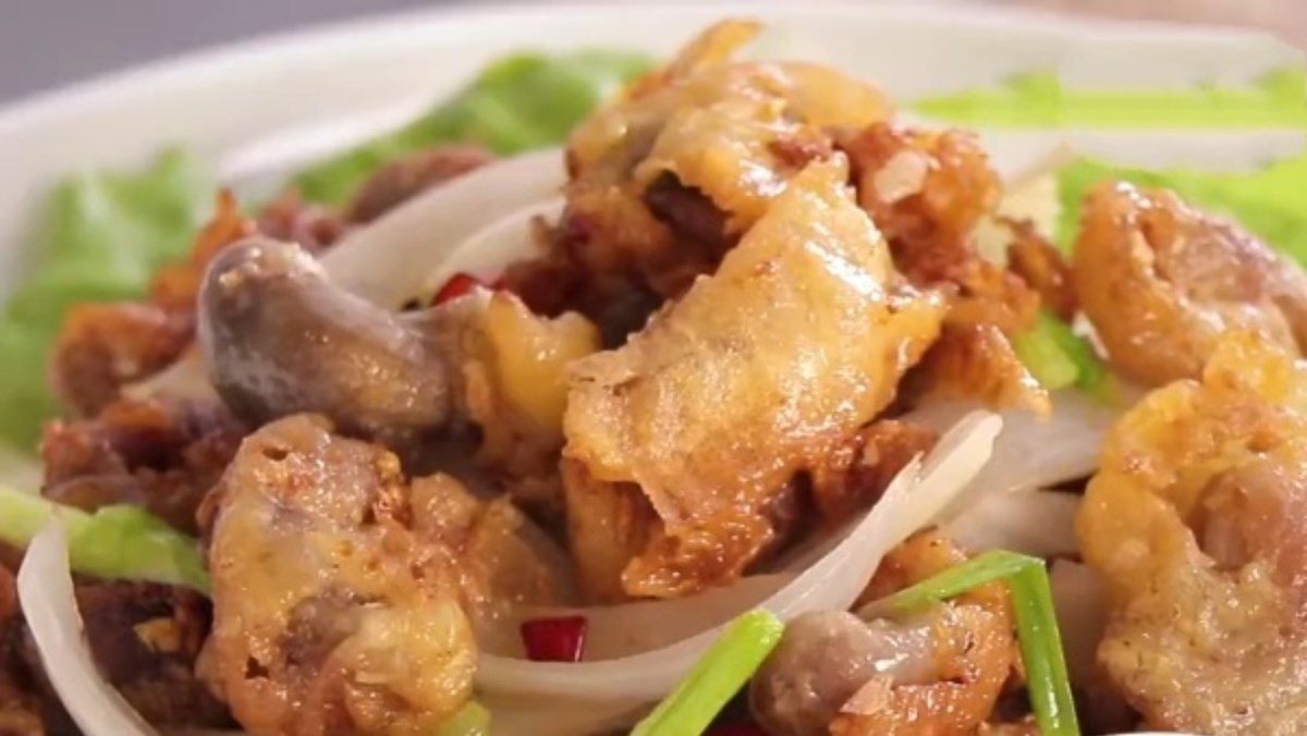 Fried basa fish intestines with garlic and chili