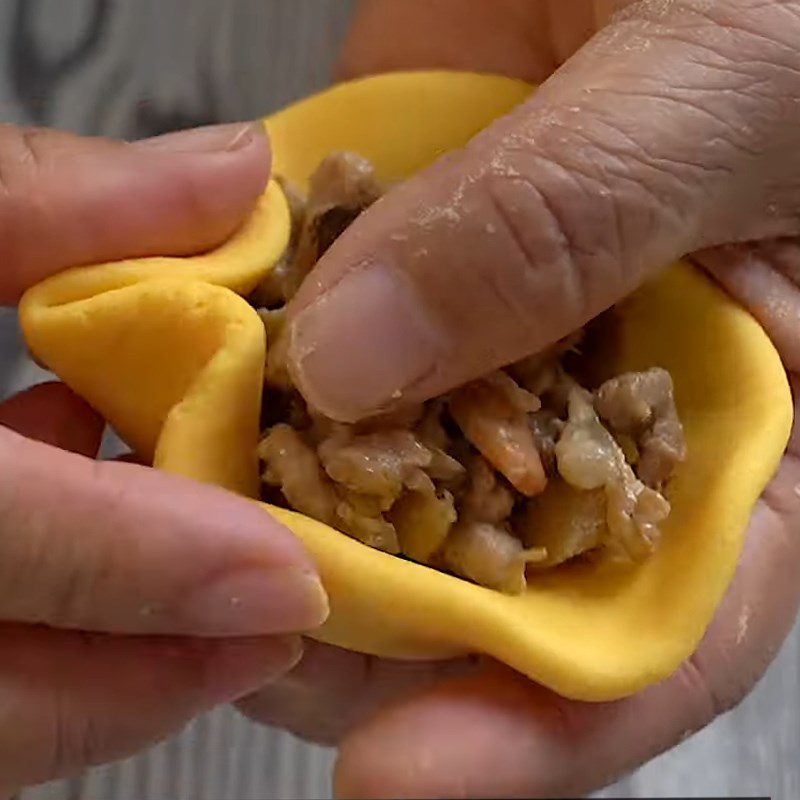 Step 4 Wrapping the filling Yellow sweet potato cake steamed