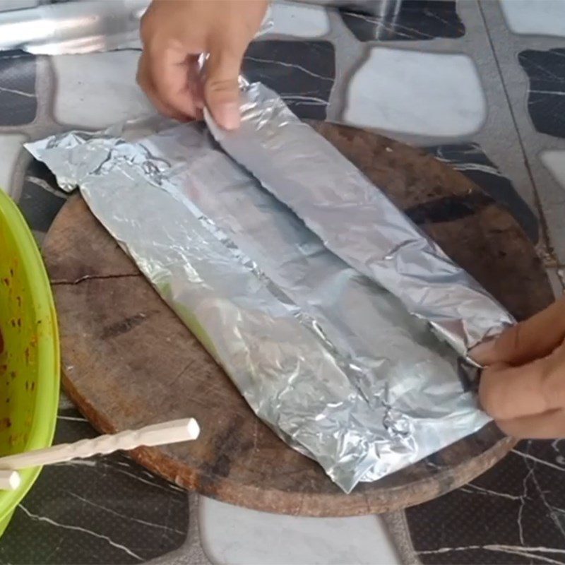 Step 3 Wrap the meat with aluminum foil Grilled pork in aluminum foil using charcoal stove