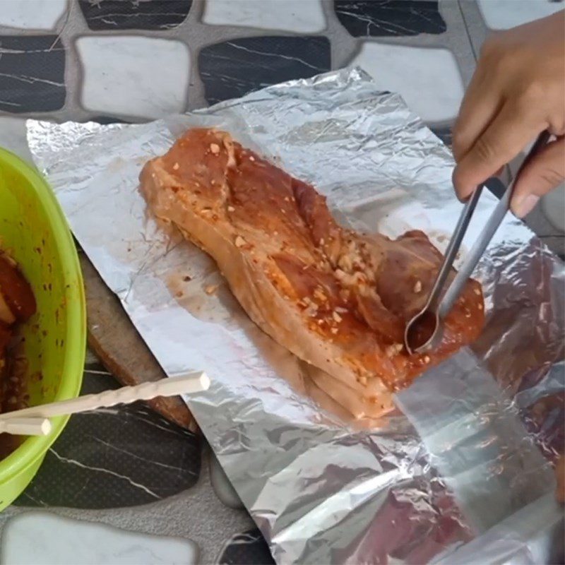 Step 3 Wrap the meat with aluminum foil Grilled pork in aluminum foil using charcoal stove