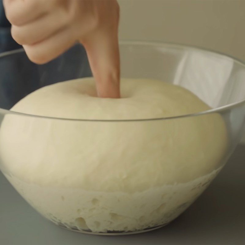 Step 3 Fermenting the dough for Cheese Bread in a pan