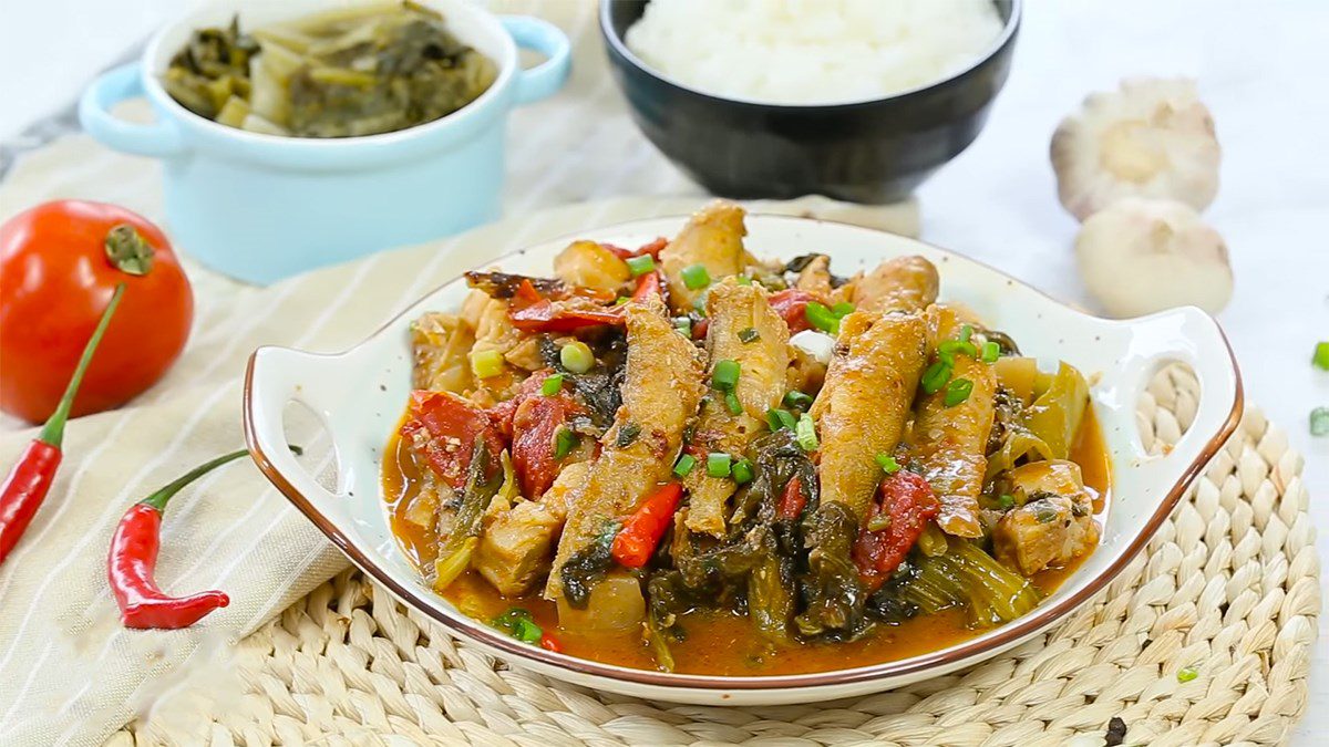 Braised goby fish with sour pickled mustard greens and pork belly