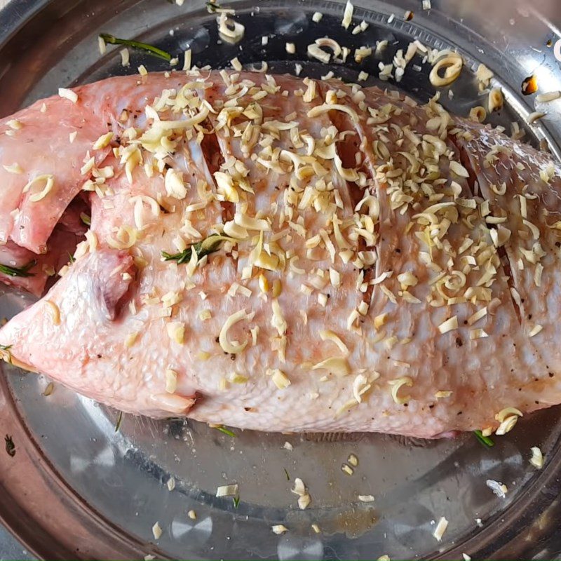 Step 2 Preparing and marinating the fish Red tilapia steamed with lemongrass