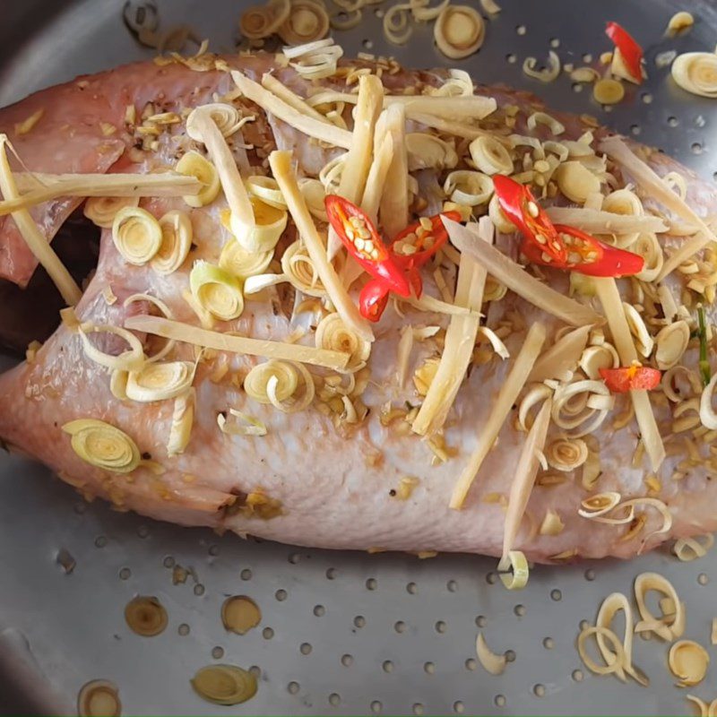 Step 3 Steaming the fish Red tilapia steamed with lemongrass