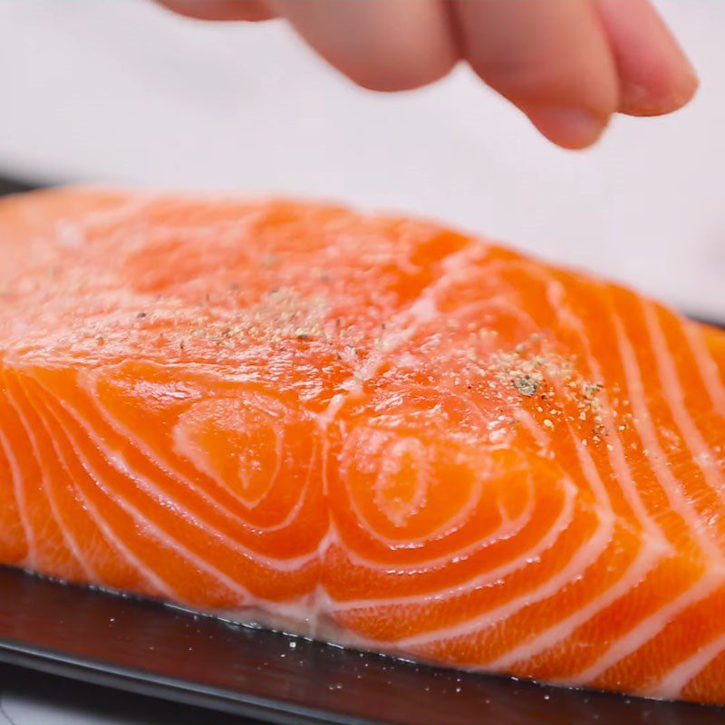 Step 1 Prepare and marinate the salmon Grilled salmon in foil with garlic butter lemon sauce