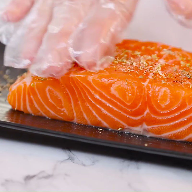 Step 1 Prepare and marinate the salmon Grilled salmon in foil with garlic butter lemon sauce