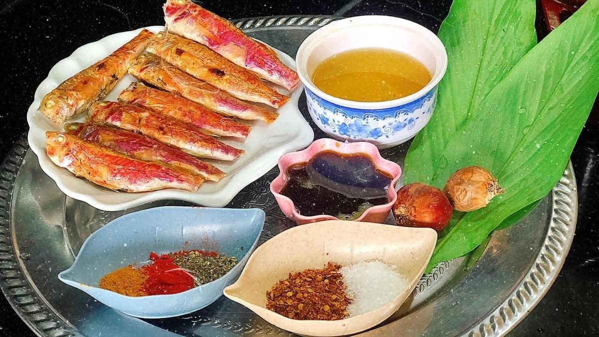 Ingredients for caramelized fish with turmeric leaves and molasses