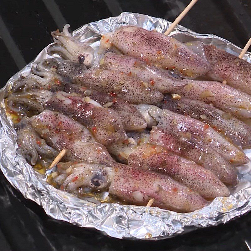 Step 6 Grilling squid Grilled squid with scallion oil