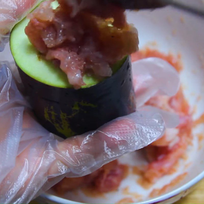 Step 2 Marinate and stuff the eggplant with meat Stuffed eggplant with meat steamed with soy sauce