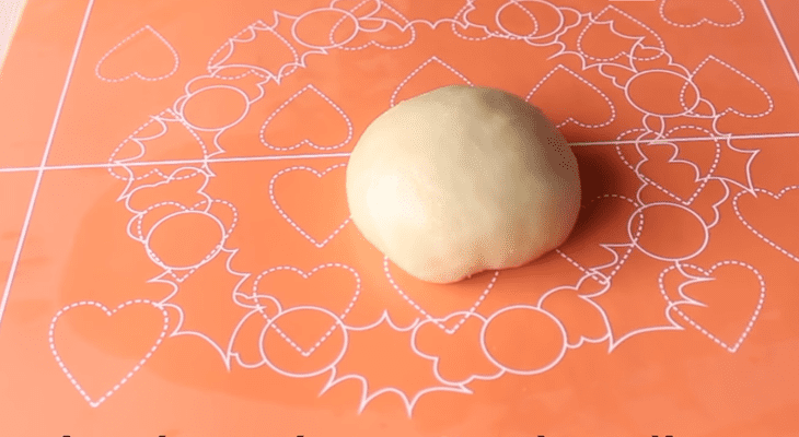 Step 6 Rolling the dough and shaping the cake Baked buns with savory filling