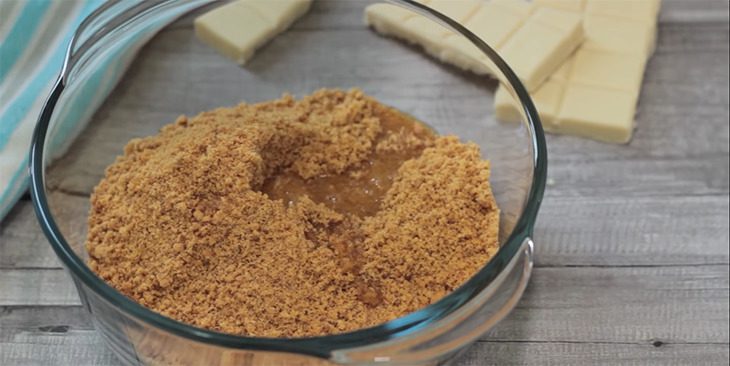 Step 1 Crush and mix cookies with melted butter to make the Mango Cheesecake base