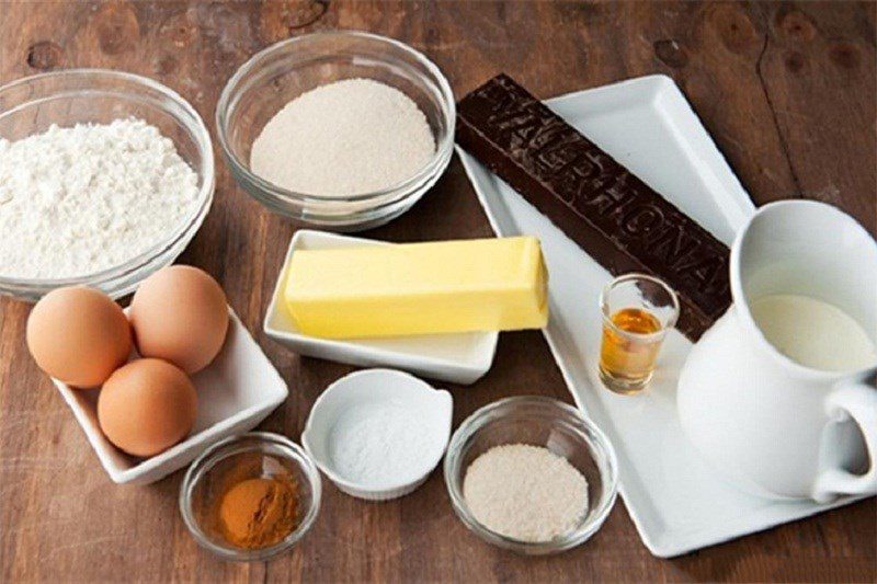 Ingredients for chocolate cream cake using a glass oven