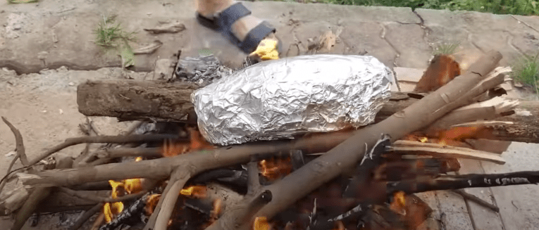 Step 4 Grilling chicken Foil-wrapped grilled chicken