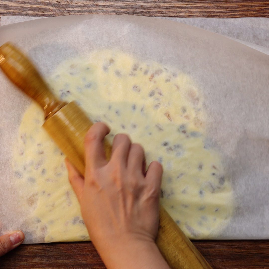 Step 3 Pour the candy mixture onto the tray Making Nougat candy with Marshmallow