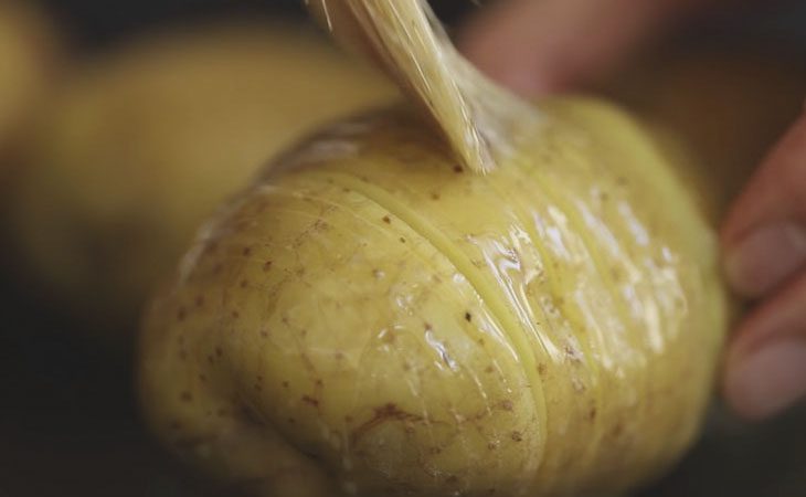 Step 3 Brush butter and bake potatoes Baked potato with cheese