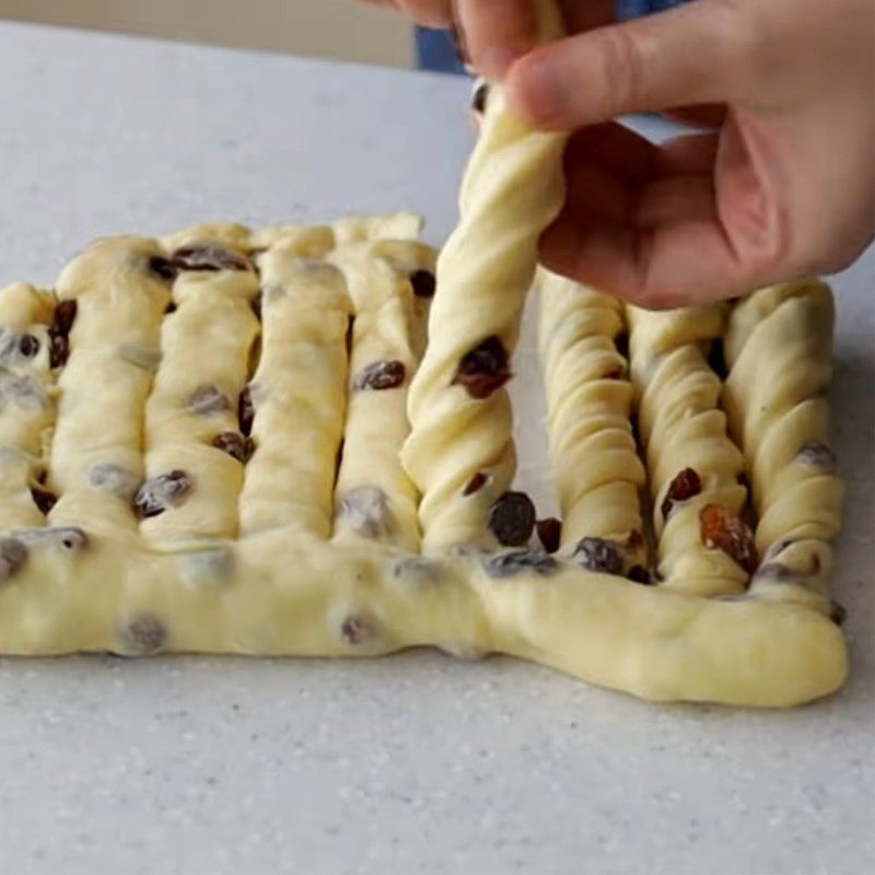 Step 4 Rolling dough and shaping the bread Sandwich bread with raisins