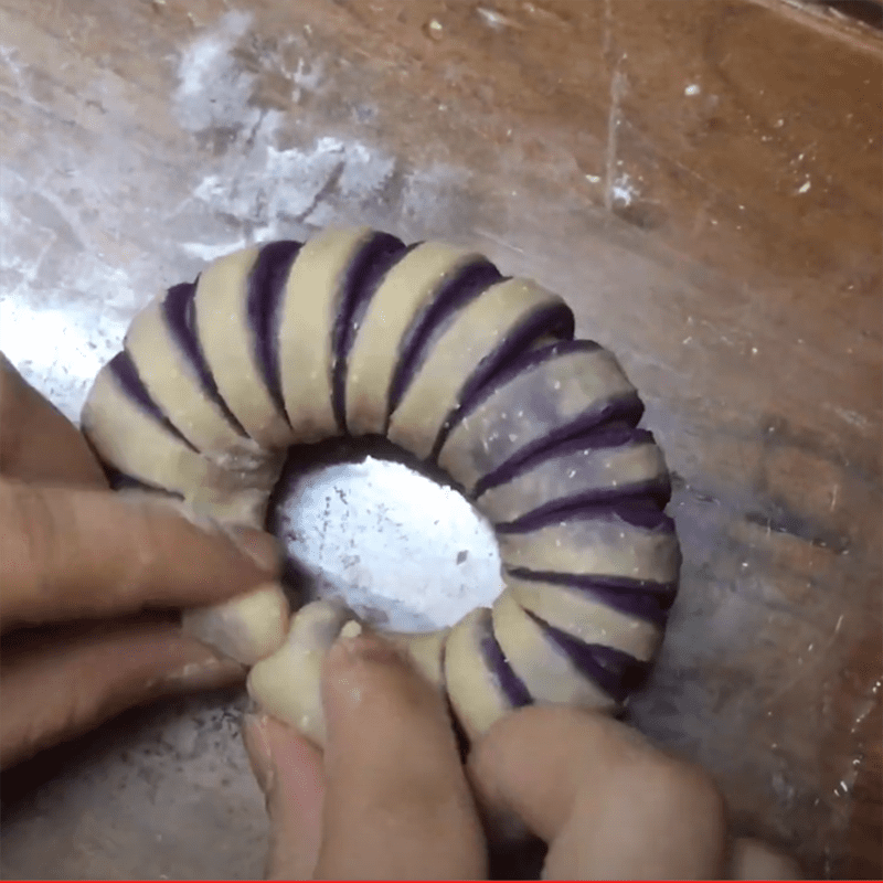 Step 5 Rolling the dough and shaping the cake Purple sweet potato bread