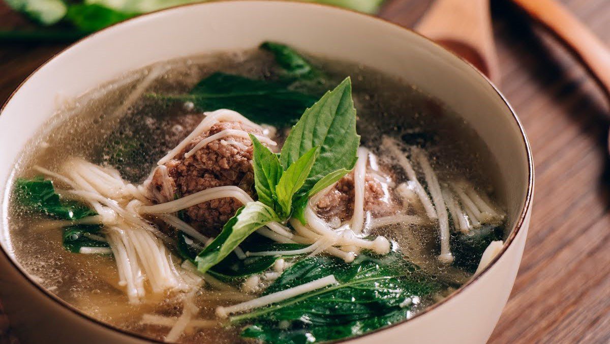 Beef ball soup with enoki mushrooms