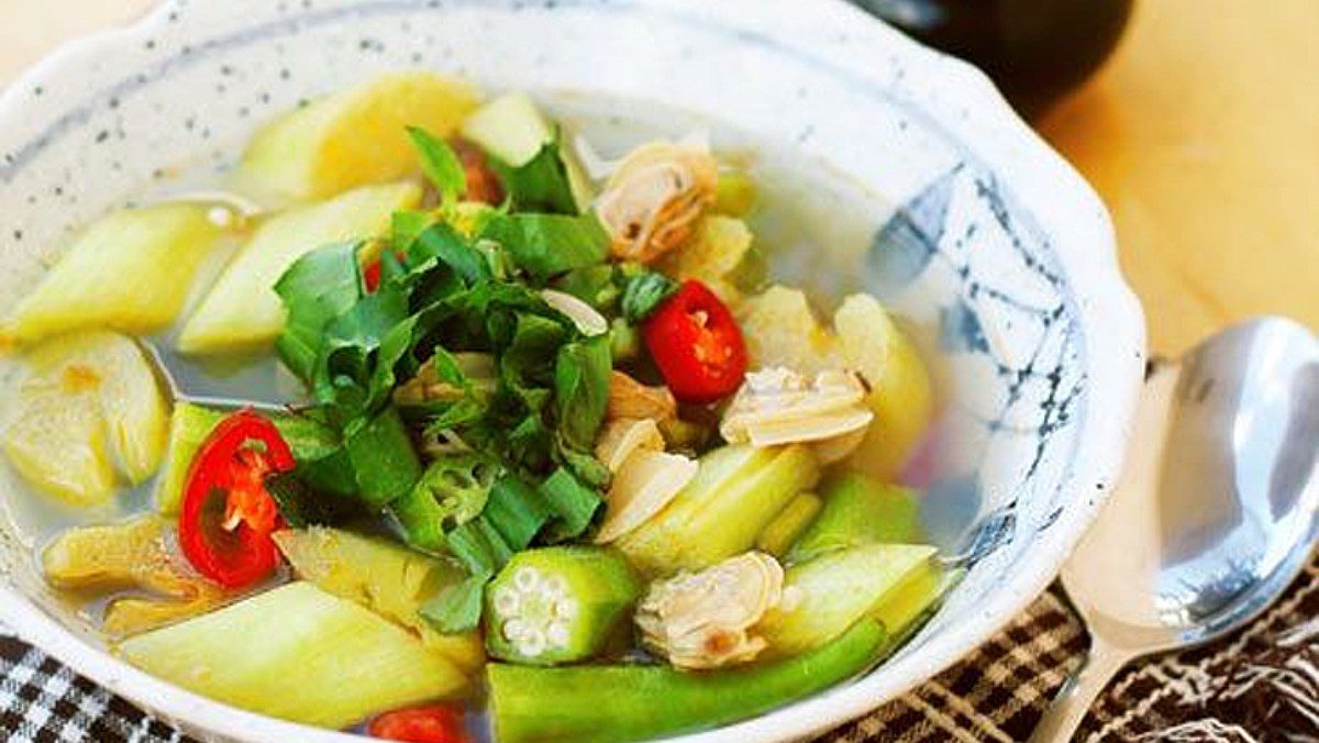 Sour clam soup (ngheu) with giant water lily stems