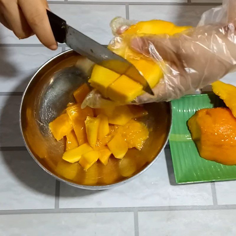 Step 1 Cutting mango Chewy Mango Cake