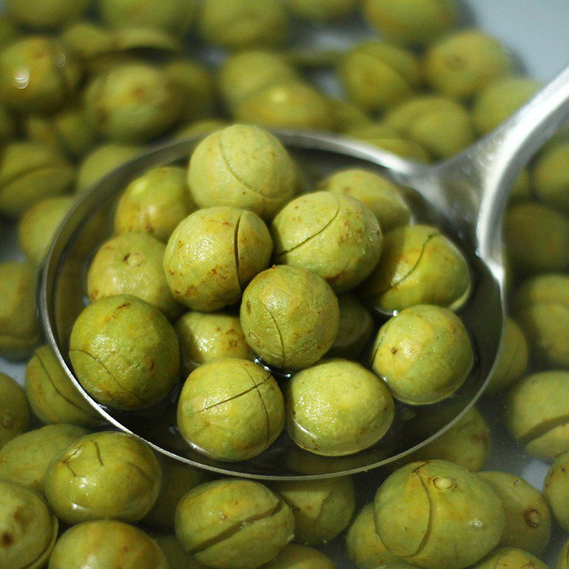 Step 2 Blanch the sour fruits in boiling water How to make pickled sour fruits by blanching in boiling water