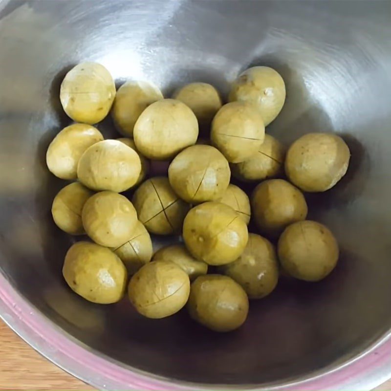 Step 2 Blanch the sour fruits in boiling water How to make pickled sour fruits by blanching in boiling water