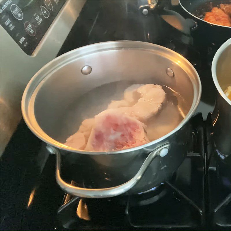 Step 3 Blanch the fish Fish with sour bamboo shoots