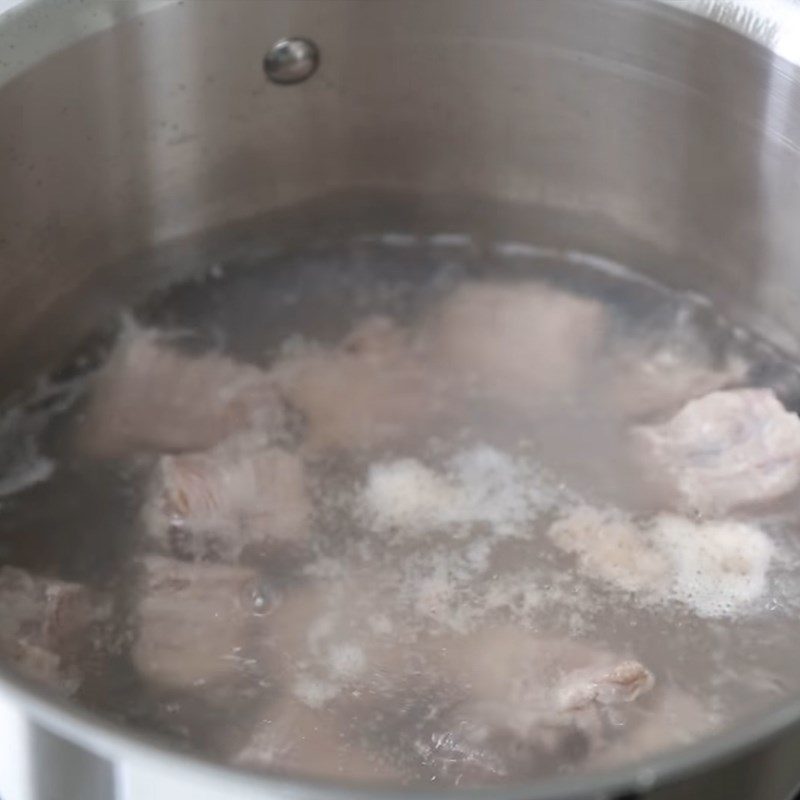 Step 2 Blanch the pork ribs for Radish Soup with Pork Ribs