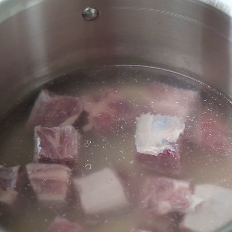 Step 2 Blanch the pork ribs for Radish Soup with Pork Ribs