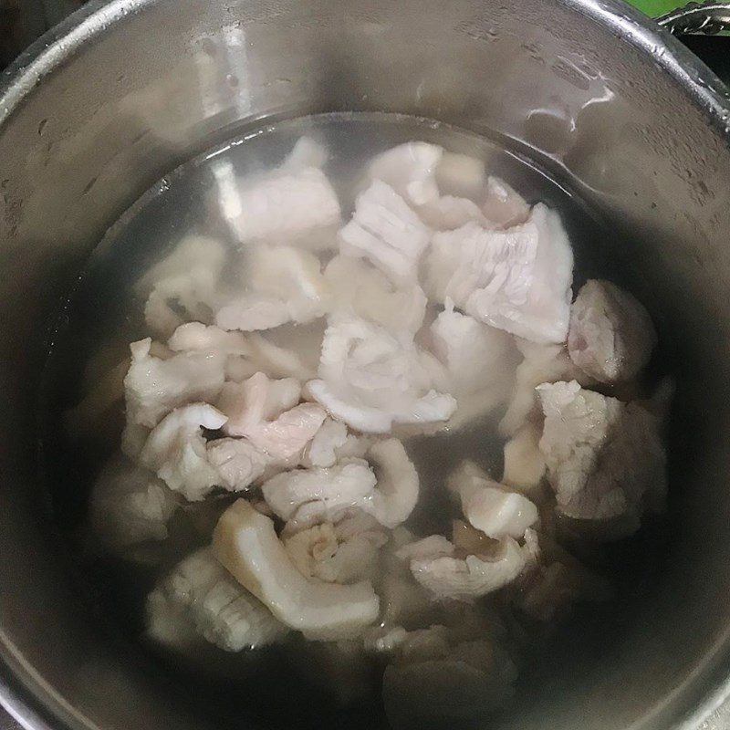 Step 2 Blanch the meat for Braised Pork with Lemongrass