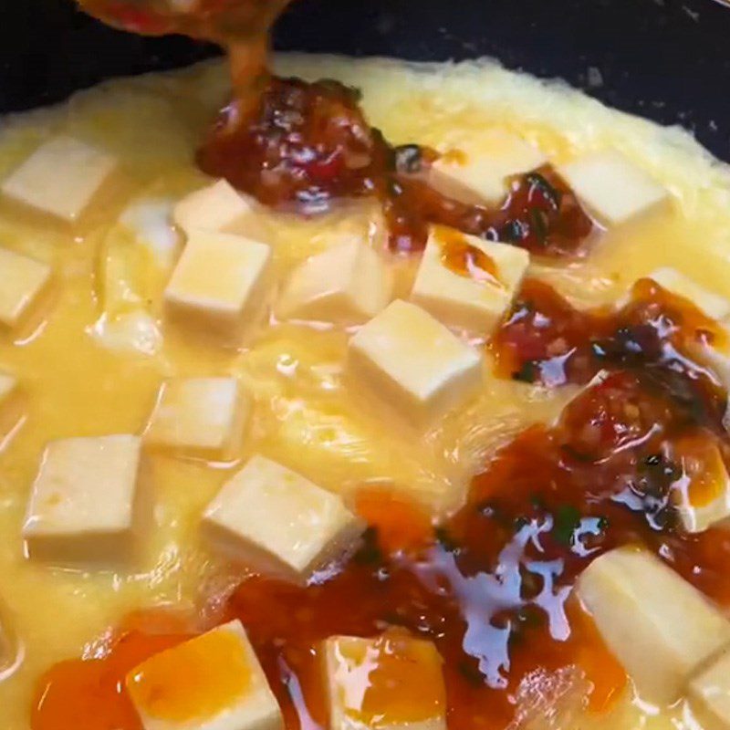 Step 4 Cooking fried egg and tofu with satay sauce