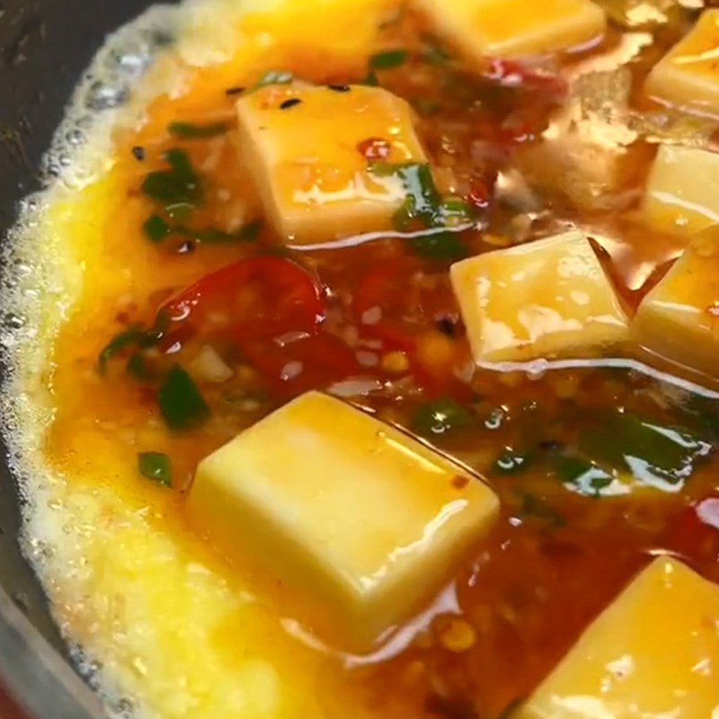 Step 4 Cooking fried egg and tofu with satay sauce