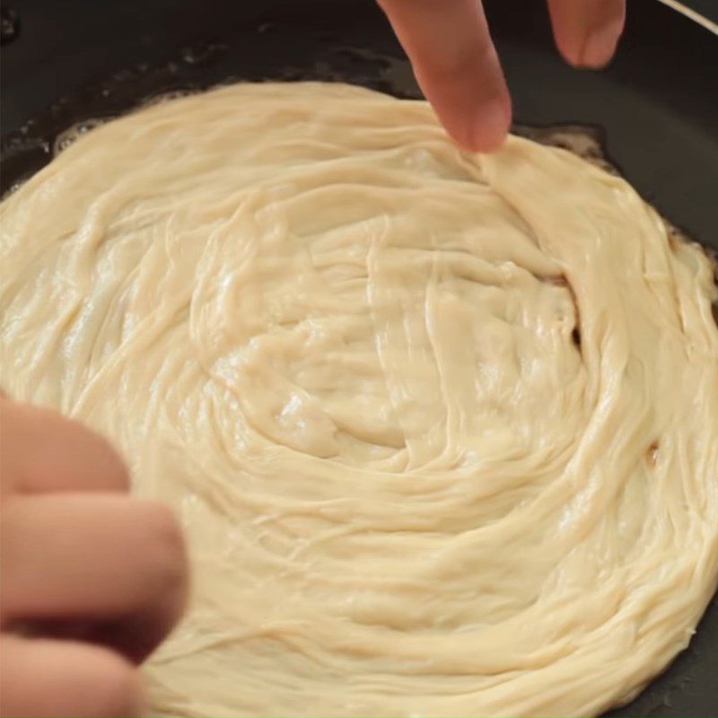 Step 4 Fry the cake Malaysian Roti - roti canai