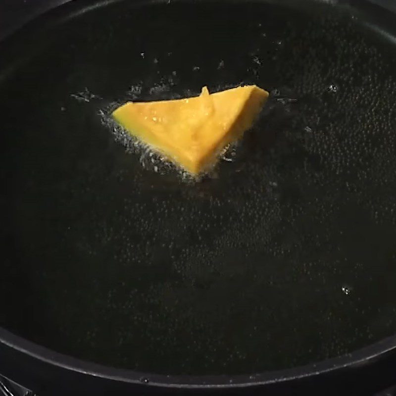 Step 2 Fry pumpkin Pumpkin stewed with seaweed