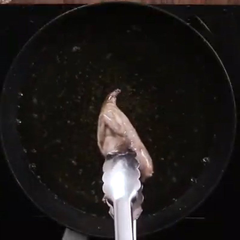 Step 2 Fry the quail for Quail stew with pumpkin