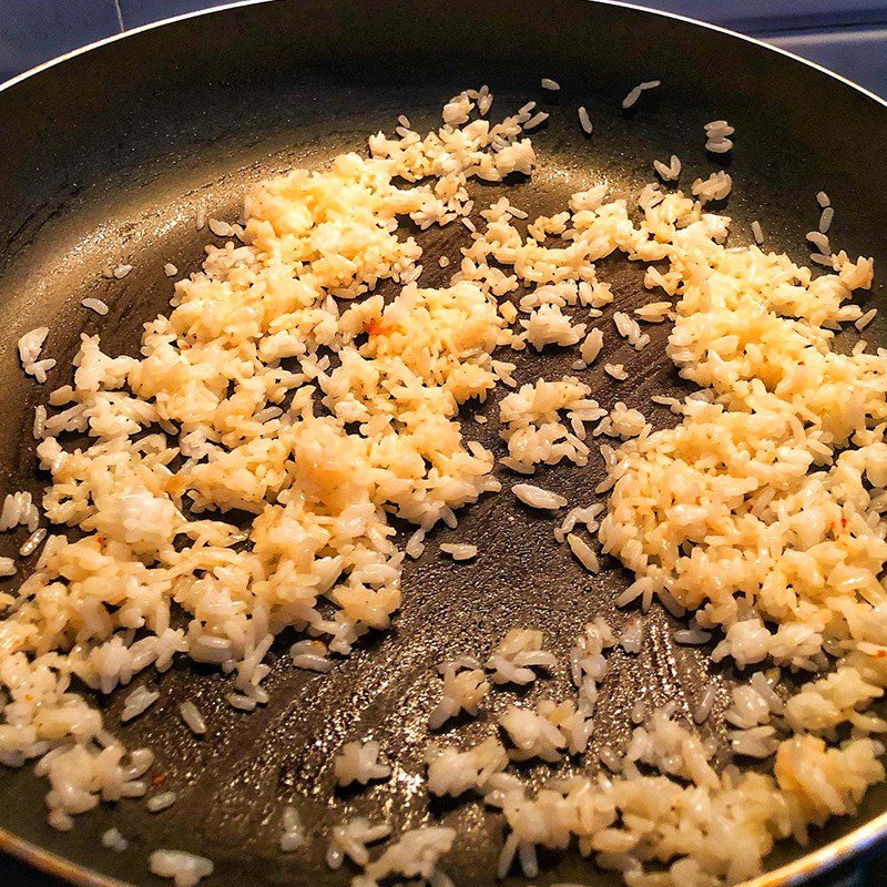 Step 2 Fry the rice for Salted Rice with Shrimp