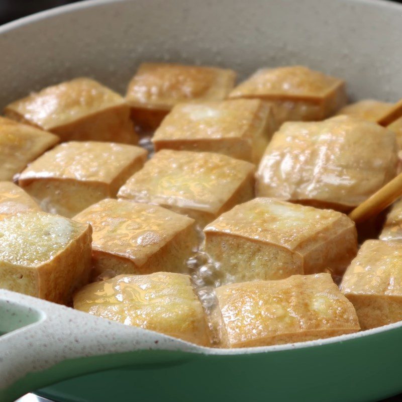 Step 2 Fry the tofu for Quail Eggs with Tofu